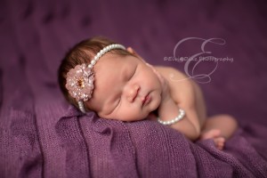 chicago-newborn-purple set up with white baby pearl handband and braclet.