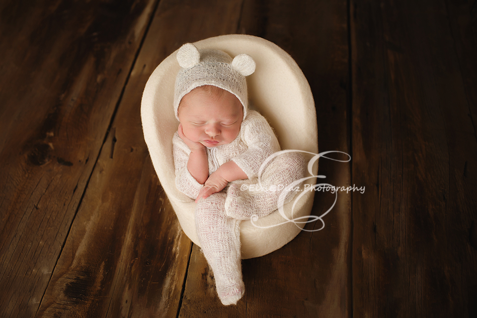 chicago-newborn-photographer-elvie-girl-wrapped-baby-bear-cream-chair-planks