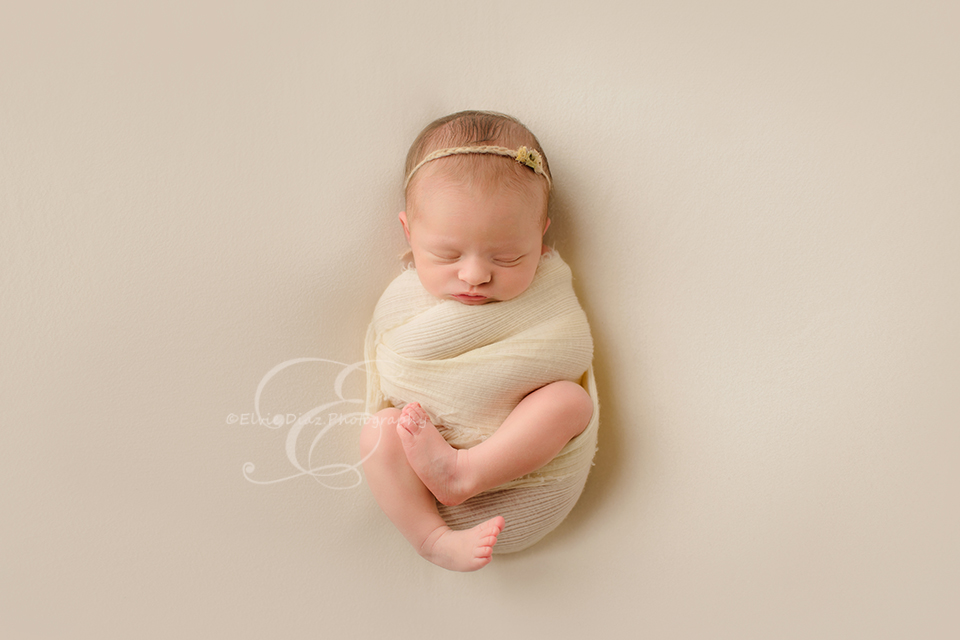 chicago-newborn-photographer-elvie-girl-wrapped-baby-cream-beauty